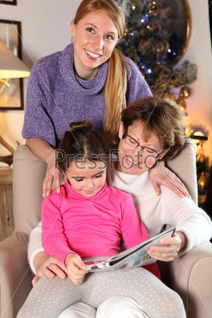 Grandmother, mother and daughter at Christmas