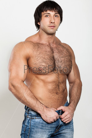 Muscular young man with naked torso