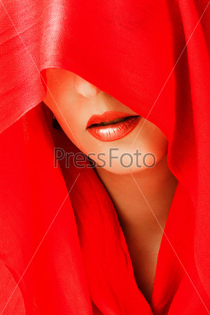 Sexy lips. red scarf covered eyes