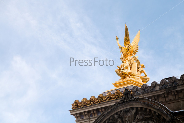 PARIS, FRANCE - MARCH 5: golden sculpture on roof of Paris Opera House in Paris on March 5, 2013. The golden figural group L Harmonie was made by sculptor Charles Gumery in 1869.