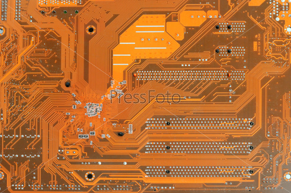 Close up of red computer circuit board as background
