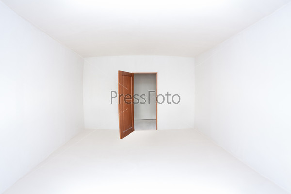 Opened door in the empty white room