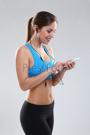 Beautiful caucasian woman in fitness wear