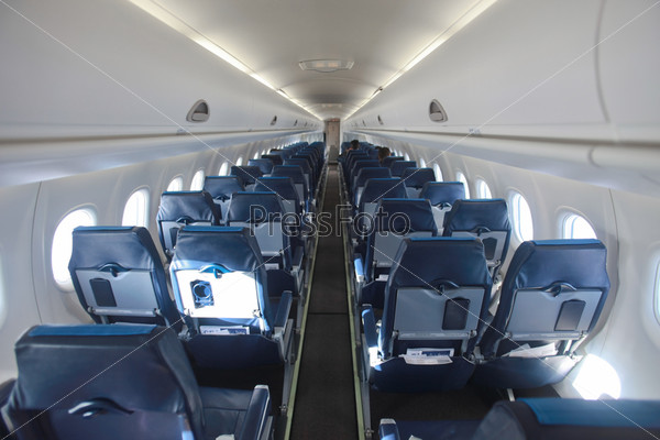 airplane interior and seats in perspective aisle