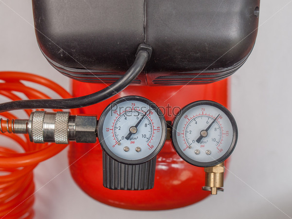 Detail of air compressor with manometer to measure air pressure