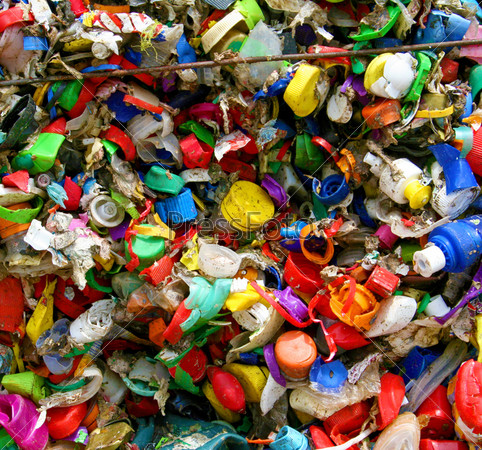 mosaic of plastic bottle tops in recycling plant in Germany