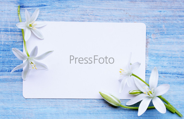 Greeting card and a bouquet of white lilies