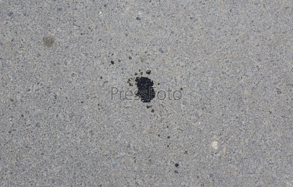 asphalt with engine oil stains