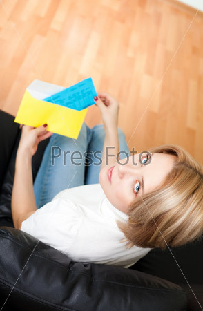 Woman received bill and opening envelope