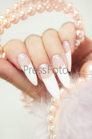 Long French manicure.
