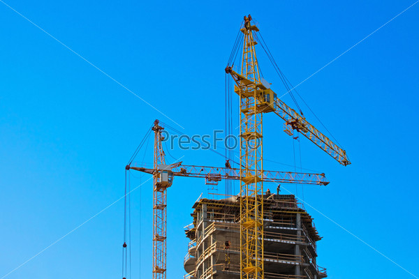 Two tower cranes building
