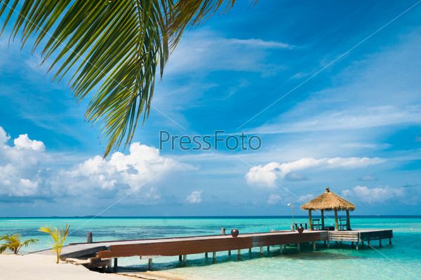 Maldivian house on a tropical island, travel background