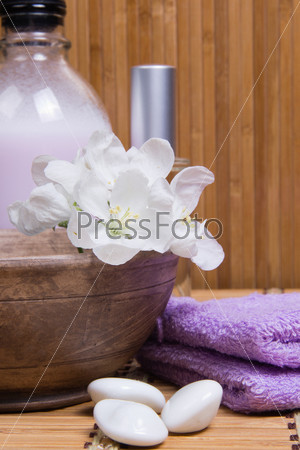 Towel, liquid soap, spray, apple-tree flowers