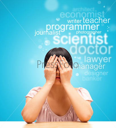 Young female student sitting with face palm and thinking about future profession