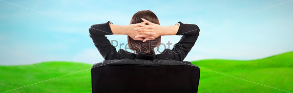 Closeup portrait of cute young business woman from behind dreaming, resting and imagine idyllic view
