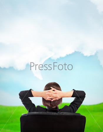 Closeup portrait of cute young business woman from behind dreaming, resting and imagine idyllic view. Blank cloud with lots of copyspace overhead