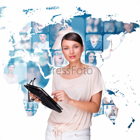 Portrait of young pretty woman working on modern tablet computer