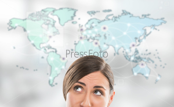 Portrait of young woman standing in front of big world map. Server locations and actual online connections are displayed on virtual map. Hosting provider concept.