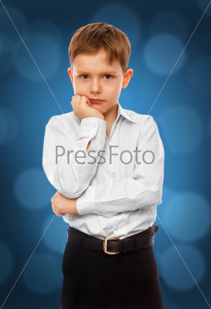 Boy child businessman thinks solves problem in white shirt and t