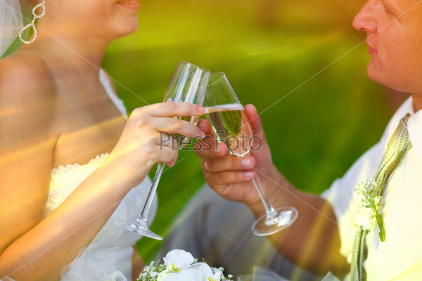 couple sunlight wedding newlyweds picnic forest clearing, bride and groom drink wine champagne