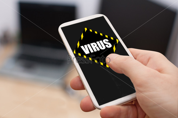 Man\'s Hand Touching Smartphone With Virus Alert on Display
