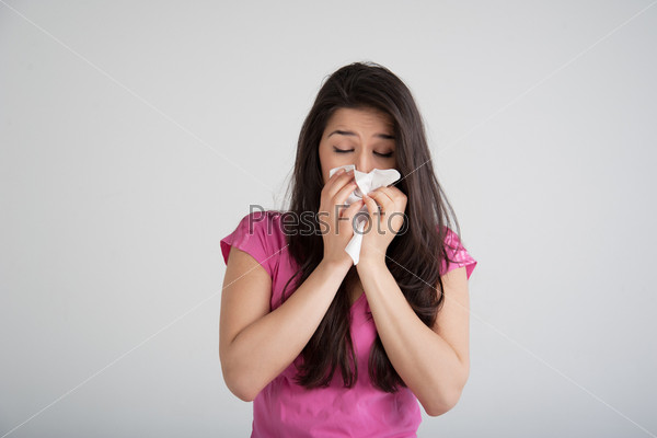 allergies, the common cold, flu-woman sneezes.