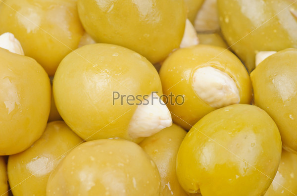Green olives stuffed with almonds  as  food  background