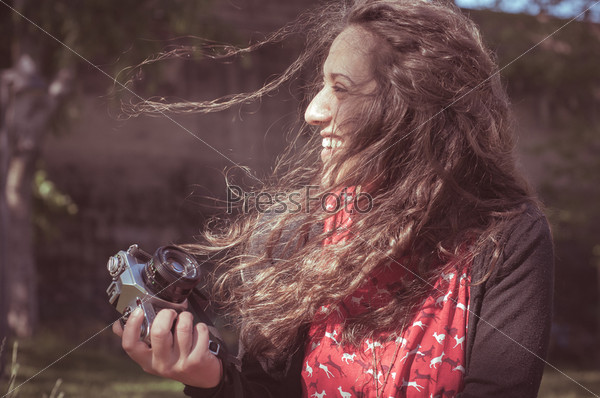 hipster vintage woman with old camera