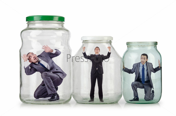 Young businessman in glass jar