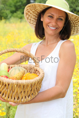 Woman with basket of fruit
