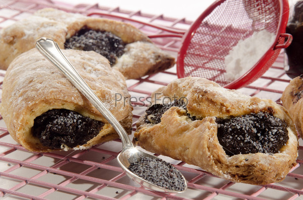 home baked pastry with plum jam and poppy seed