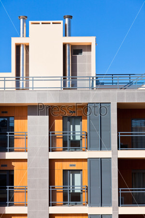 New Resort Apartment House against bright blue sky