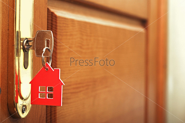 A key in a lock with house icon on i