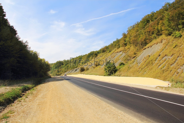 Summer landscape with road and sky, stock photo