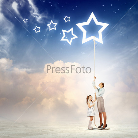 Family pulling rope with a star symbol