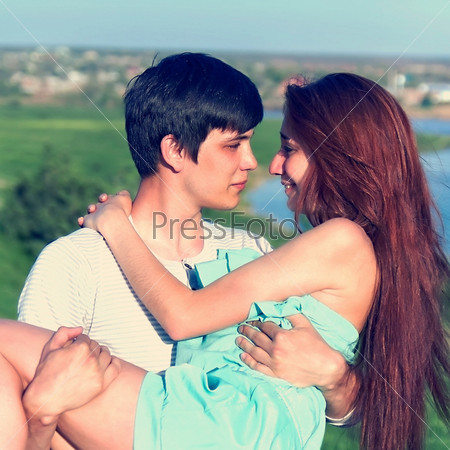 summer outdoors portrait of young sensual couple