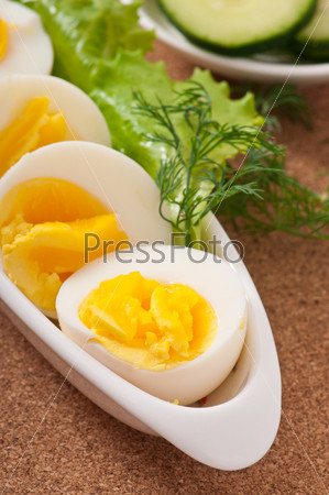 Boiled eggs on white plate