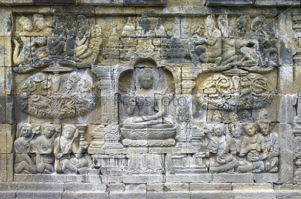 Stone carving in the Borobudur temple near Yogyakarta on Java island, Indonesia