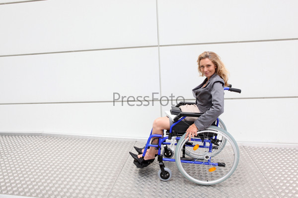 Female executive using wheelchair