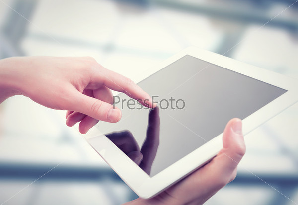 White Tablet With A Blank Empty Screen In The Hands