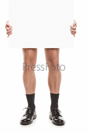 Naked man in black socks and shoes holding blank placard
