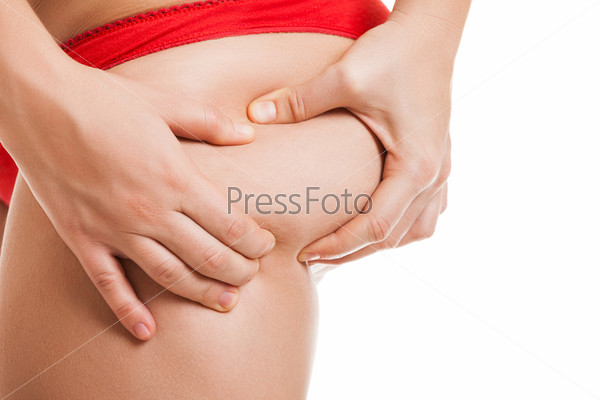 Overweight woman holding or pinching fat body bottom or buttocks
