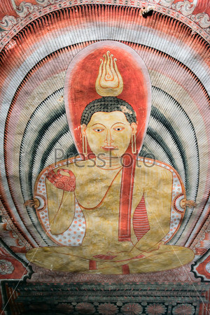 DAMBULLA, SRI LANKA - APR 17: Buddha painting in Cave temple on Apr 17, 2013 in Dambulla, Sri Lanka. This complex is  a World Heritage site and dates back to the 1st century BC.