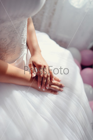 beautiful female hands with nail polish bride