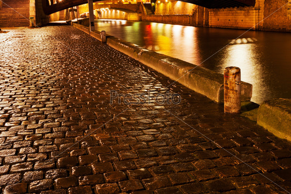 Quay in Paris at night