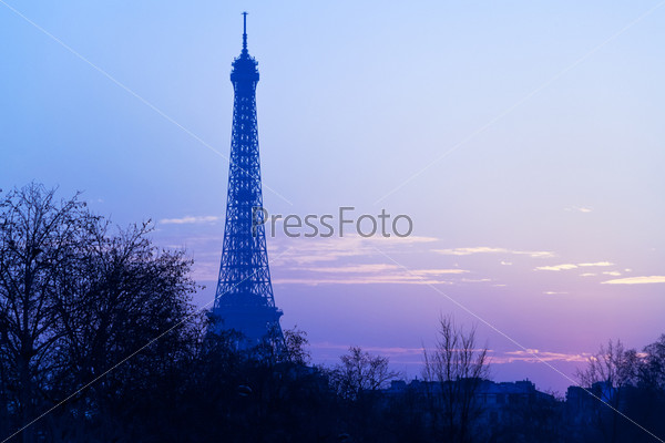 eiffel tower in Paris on cold blue sunset