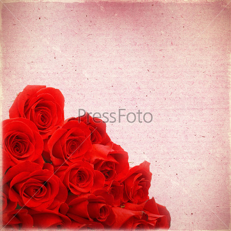 Bouquet of red roses on a background of old paper grunge, for any of your project