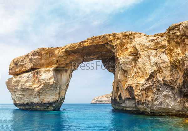 Azure Window, famous stone arch of Gozo island in the sun in summer, Malta