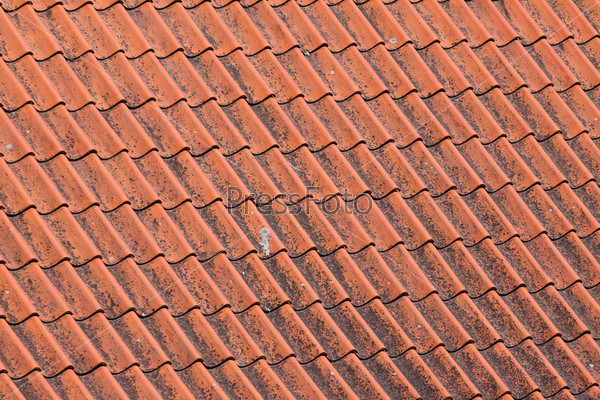 Old red roof tiles background details
