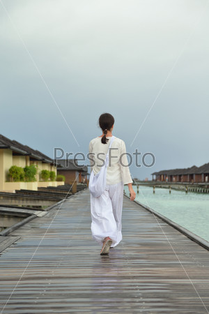 young woman relax on cloudy summer day and bad weather